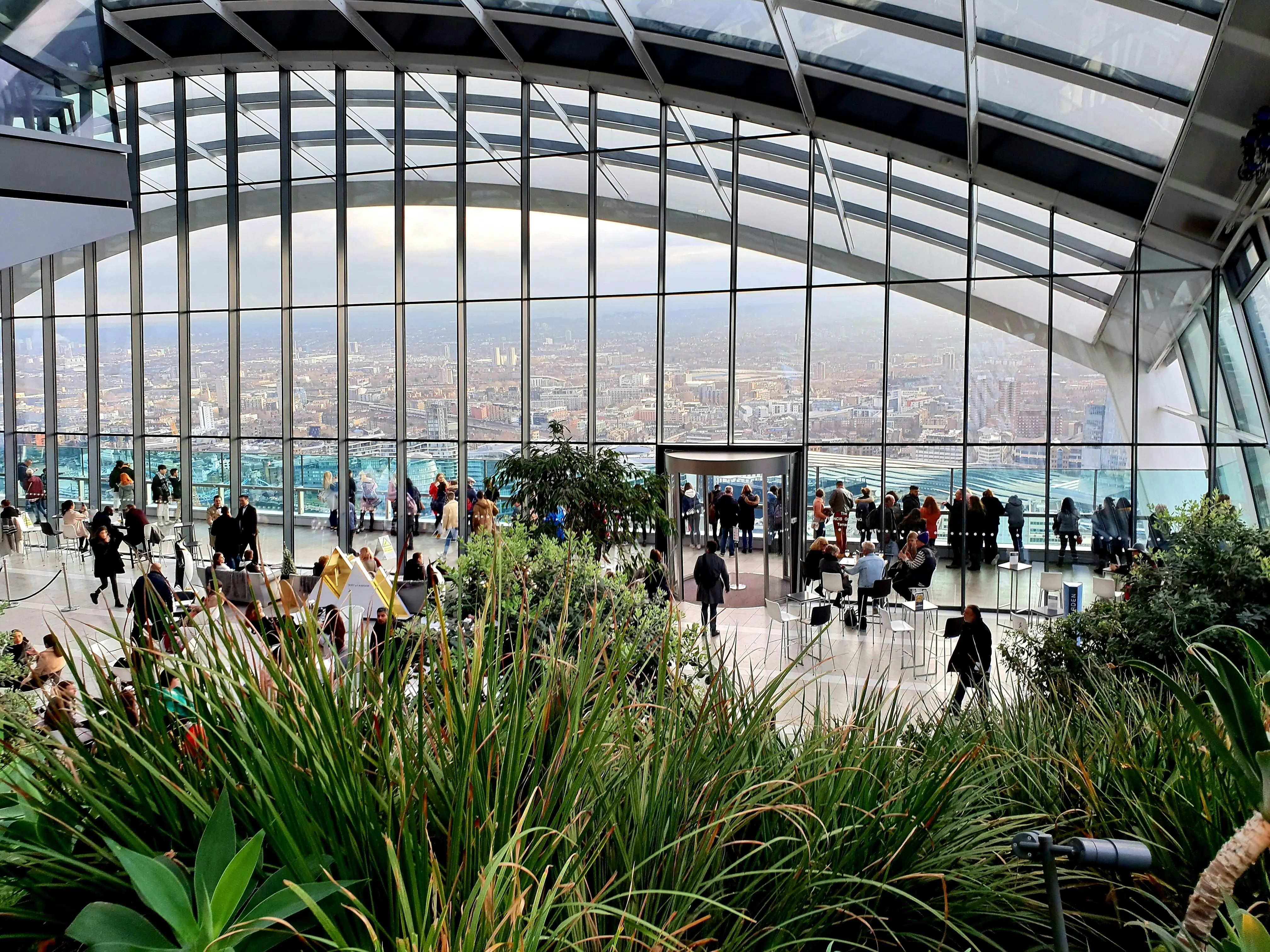 Free People Inside The Sky Garden With View Of Cityscape Stock Photo